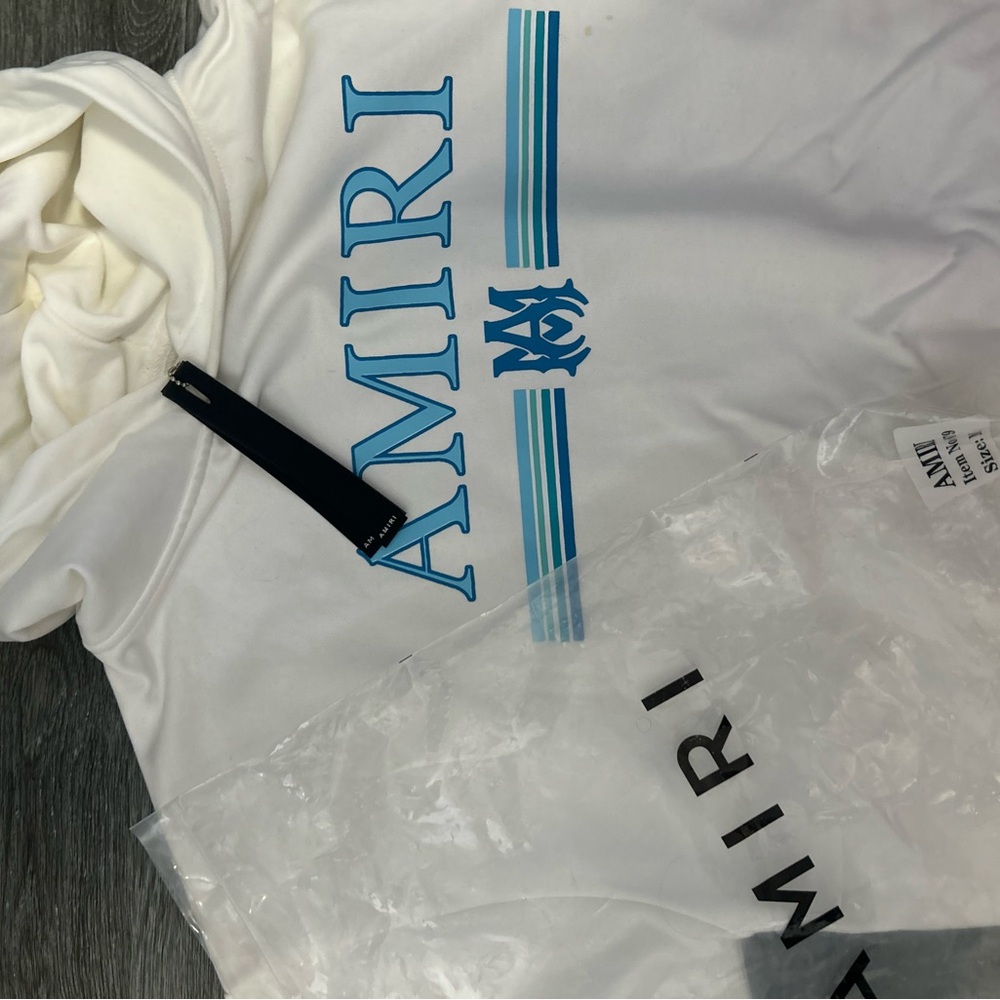 AMIRI White Garment with Blue Accents